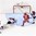 GRAND FORKS, NORTH DAKOTA - APRIL 18: The puck gets past Latvia's Gustavs Grigals #29 for a Russia goal while Latvia's Regnars Udris #4, Latvia's Markuss Komuls #2, and Russia's Danil Lobanov #11 look on during preliminary round action at the 2016 IIHF Ice Hockey U18 World Championship. (Photo by Matt Zambonin/HHOF-IIHF Images)

